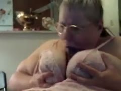 On livecam, an elderly fattie is engrossed in a sextoy.